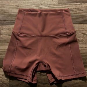 This is a pair of aerie maroon biker shorts in a size xs.